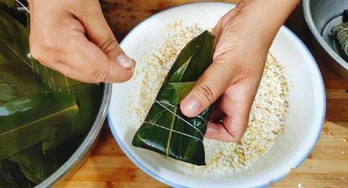 广东人包粽子视频,包粽子的传统技艺与风味传承